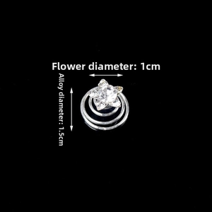 Detailed macro view showing the 1cm rhinestone flower design on a silver alloy hair coil