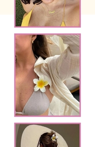 Detailed view of plumeria hair clip and gold Flor necklace on model for tropical beach look