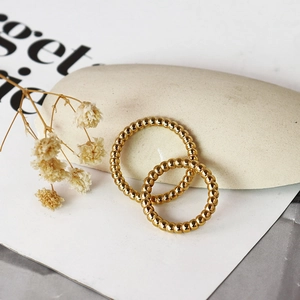 Set of two vintage French style gold beaded titanium steel rings with mirror finish