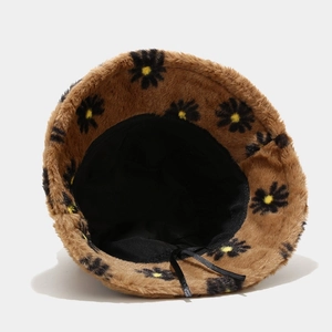 Brown faux rabbit fur bucket hat with daisy pattern and adjustable inner lining
