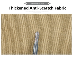 Close-up of durable scratch-resistant canvas fabric being tested with a metal key