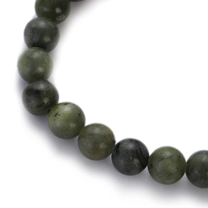 Detailed close-up of dark green natural stone beads with polished glossy finish