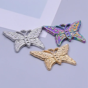 Three butterfly stainless steel charms in silver, gold, and rainbow finishes for DIY jewelry