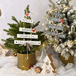 Hanging wooden Christmas tree ornaments with red stars and bells for festive home decor