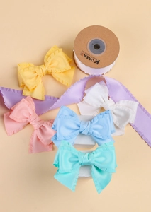 Ensemble de barrettes nœuds aux couleurs macaron avec détail de ruban plissé violet