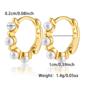 Detailed view of gold pearl hoop earrings with size 1cm and weight 1.4g specs
