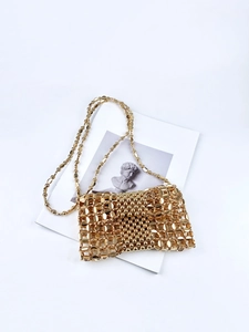 Artisan silver woven chain crossbody mini purse with metallic beads and intricate mesh texture