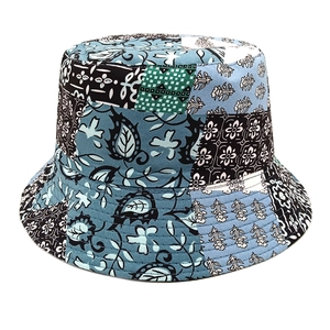 Top view of a patchwork bucket hat featuring vintage paisley and geometric patterns