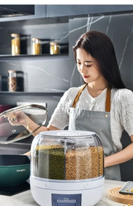 Detailed macro view of rotating grain dispenser with divided transparent compartments