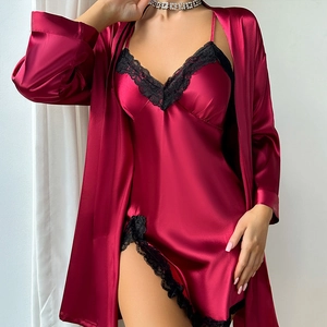 Women's dark red silk satin pajama set with black lace trim and matching robe