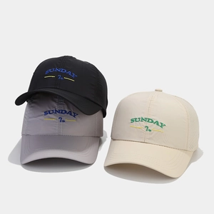 Close-up of letter embroidery and breathable laser-cut holes on quick-dry baseball caps