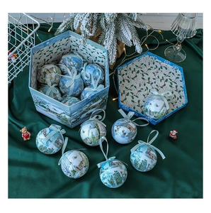 Blue and white Christmas ornament ball set with festive winter scene in a hexagonal gift box