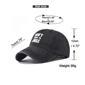 Detailed size guide for washed cotton baseball cap with Don't Forget to Smile text