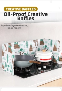 Three-fold kitchen oil splash guard with cactus pattern around a cooking stove