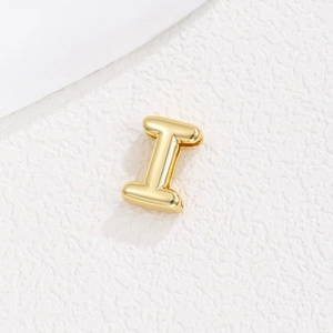Close-up of polished gold-plated letter I charm for 10mm DIY charm bracelets