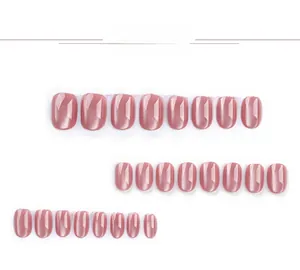 Detail view of 24 pieces dusty rose cat eye press-on nails with metallic luster