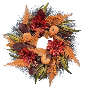 Couronne d'automne avec citrouilles, dahlias rouges et baies sur fond blanc pur