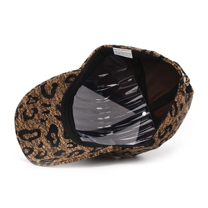 Detail view of the leopard print baseball cap interior featuring polyester fabric and lining
