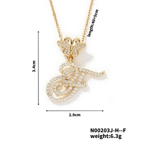 Macro shot of gold zircon butterfly and letter F pendant necklace with size dimensions