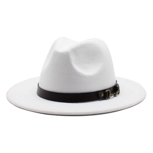 Detail of white wool fedora hat featuring a brown leather band with bronze metal buckle