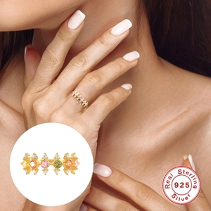Luxurious S925 sterling silver ring with colorful gemstones in a jagged gold setting