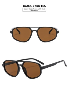Detail view of double bridge aviator sunglasses with bright black frames and dark tea lenses