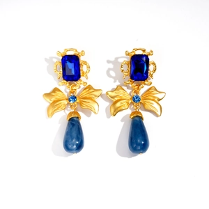 Vintage gold and blue drop earrings with crystal bow and marble texture waterdrop