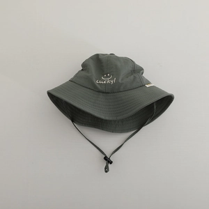 Detail of grey-green kids sun hat with Lucky! smile embroidery and adjustable chin strap
