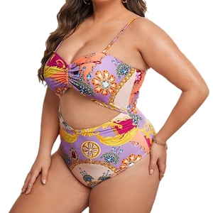 Plus size one-piece swimsuit with baroque print and waist cut-out on white background