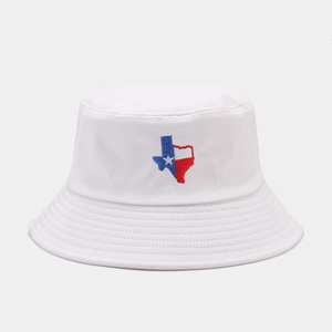 White cotton bucket hat featuring Texas state flag embroidery in a minimalist flat lay