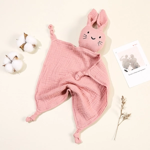 Close-up of pink bunny security blanket made of soft double-layer cotton gauze