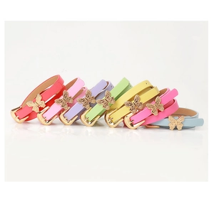Close-up of assorted PU leather belts with decorative gold butterfly buckles in seven colors