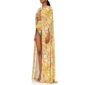 Detailed view of 3-piece floral bikini set with yellow tassels and matching floor-length cape