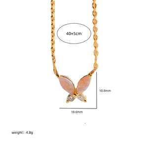 Gold titanium butterfly necklace with pink opal pendant showing measurements and weight
