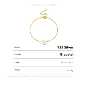 Detail of 925 sterling silver gold plated bracelet with 13mm oval charm and zircon stone