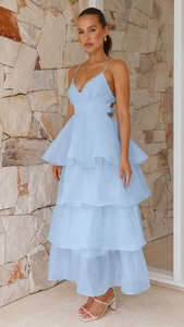Detail of light blue tiered cake dress showing chiffon layers and slim shoulder straps