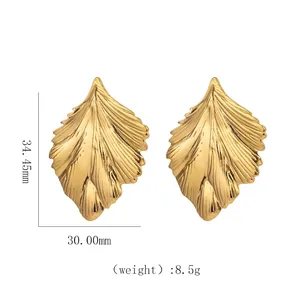 Macro detail of leaf earrings showing 34.45mm length, 30.00mm width, and 8.5g weight
