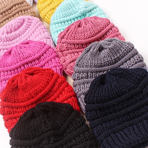 Detailed view of ribbed knit pattern and multiple colors of baby winter beanies