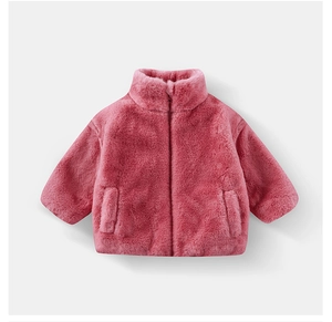 Detail of pink faux fur kids jacket showing plush texture and high-density soft fleece