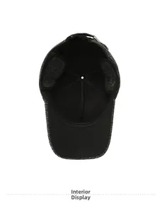 Detail view of the warm fleece lining and plaid wool fabric of the men's winter cap