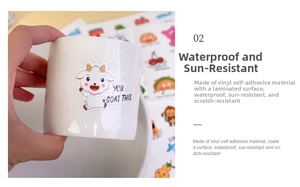 Waterproof vinyl cartoon sheep sticker showing application on a white water bottle