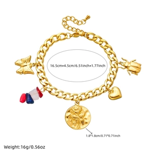 Detail of gold-plated stainless steel charm bracelet with butterfly, coin and colorful stones