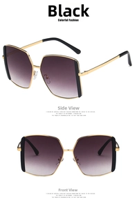 Detail of oversized black square sunglasses with gradient lenses and slim metal frames
