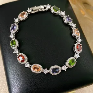 Luxurious silver rainbow bracelet with multi-color oval gemstones and zircon accents
