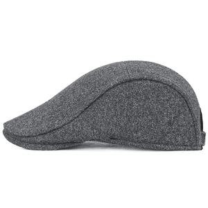 Dark grey men's winter wool flat cap with ear protection and detailed stitching