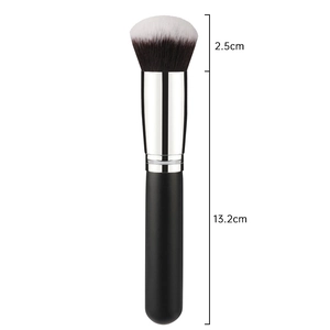 Detail view of round foundation brush with 2.5cm fiber bristles and 13.2cm handle