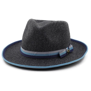 Detail of dark grey wool fedora featuring blue striped ribbon and brass buckle accent
