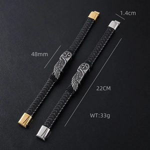 Braided leather bracelet for men with wings and cross ornaments in gold and silver