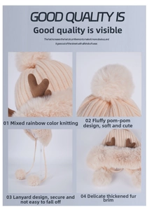 Detail view of winter knitted earflap hat with large faux fur pom-poms and cute deer antlers