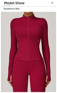 Detail view of raspberry red yoga jacket with thumbholes and high-waist sports leggings